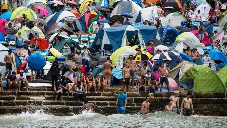 People camp at McMahons Point in anticipation of the New Year's Eve fireworks on Sydney Harbour. Photo: Dominic Lorrimer