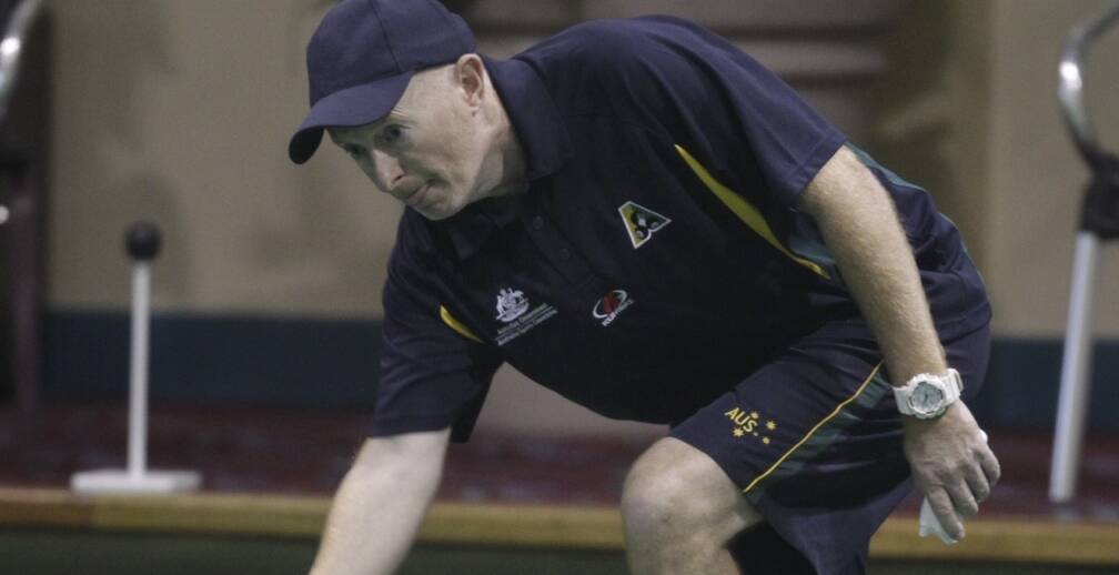 Australia representative David Holt claimed a spot in the semi-finals with a tough straight sets win over Ireland's Ian McClure in their round nine match of the World Cup on Monday at Warilla Bowling Club. Picture: ANDY ZAKELI