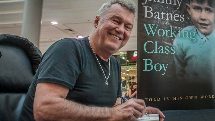 Rock legend Jimmy Barnes signs copies of his autobiography <i>Working Class Boy</i>.  Photo: Karleen Minney