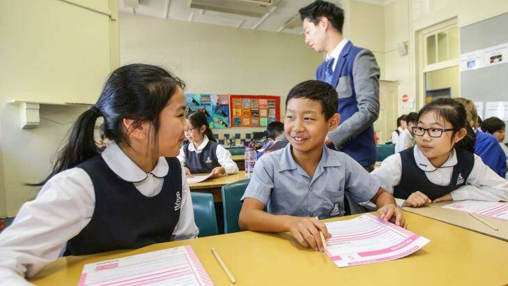 Strathfield South Public School year 5 students Michelle Chen, Yiru Jang and Yehna Jeong sat the NAPLAN test on Tuesday.   Photo: Dallas Kilponen