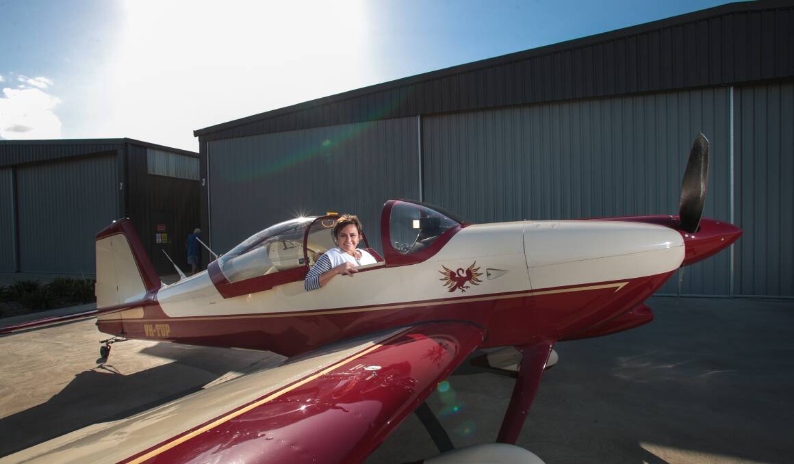 Marie Louise at Albion Park airport in the RV6 plane she's flying around Australia.Picture: ADAM McLEAN