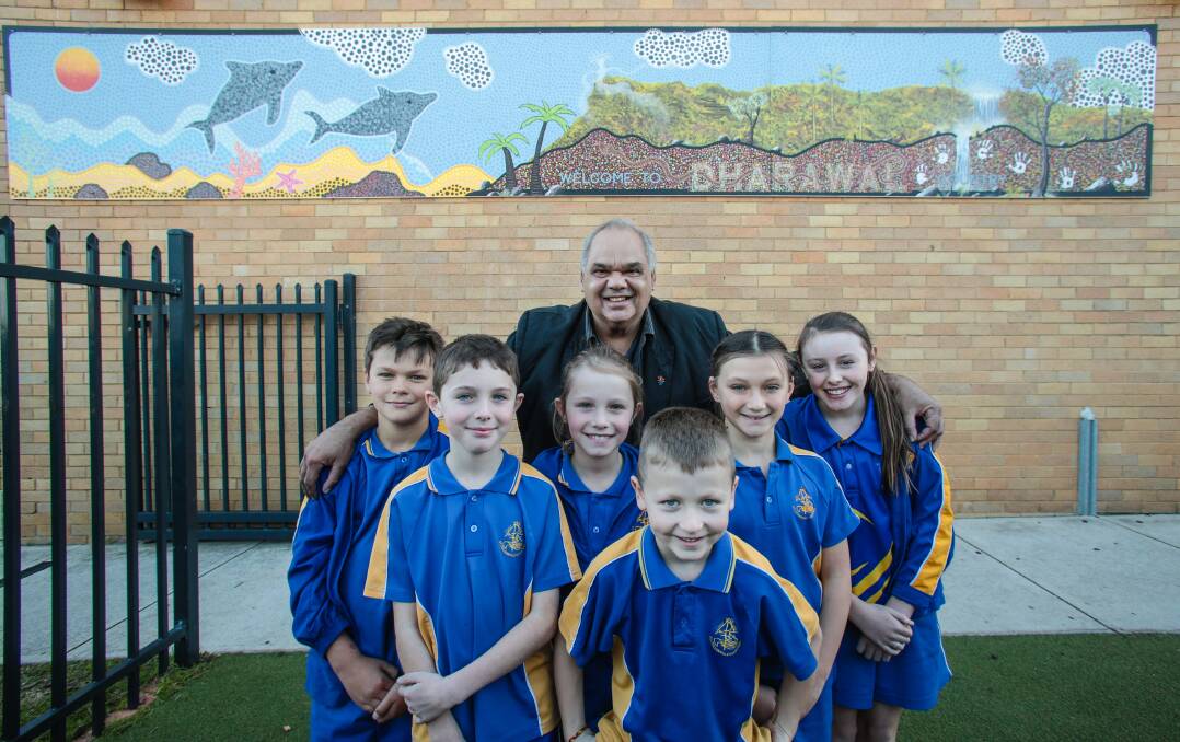 St Columbkilles Catholic Primary School students Iley Tubie-Moran, Joel Dyer, Ashley Dyer, Lucas Cooper, Michala Tubie-Moran and Jade Curren with Uncle Kevin Butler. Picture: ADAM McLEAN