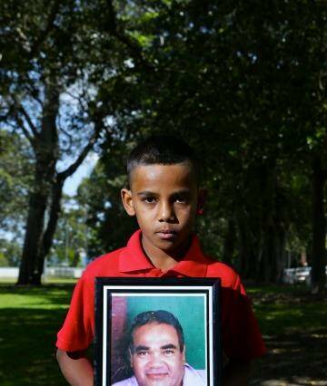 The family of Aboriginal father-of-four Mark Mason, who was shot dead in a police operation in November 2010, waited three years for the coroner to complete his investigation. Among the children left behind are his son Trent, now 10 years old. Photo: Dallas Kilponen