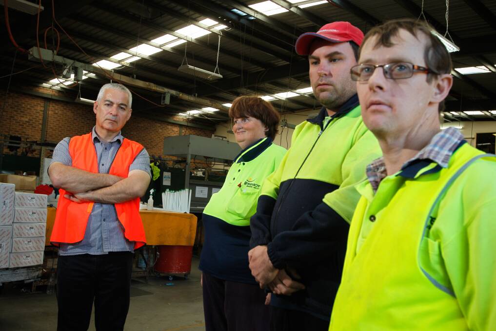 Disappointed: Greenacres CEO Chris Christodoulou with workers Joanne Newman, Daniel Demaagd and Gerry Gooden.Picture: CHRISTOPHER CHAN