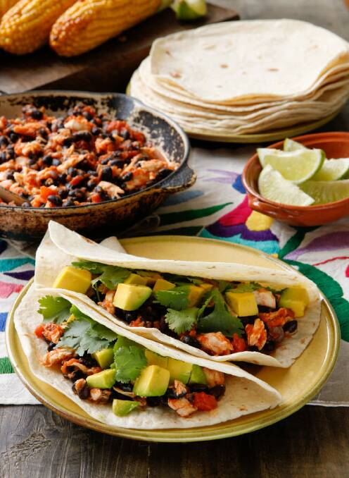 Slept in? Lunch on Caroline Velik's fresh 'n' zesty tortillas with spicy tomato, fish and black beans <a href="http://www.goodfood.com.au/good-food/cook/recipe/tortillas-with-fish-and-black-beans-20111019-29umq.html"><b>(Recipe here).</b></a> Photo: Marina Oliphant