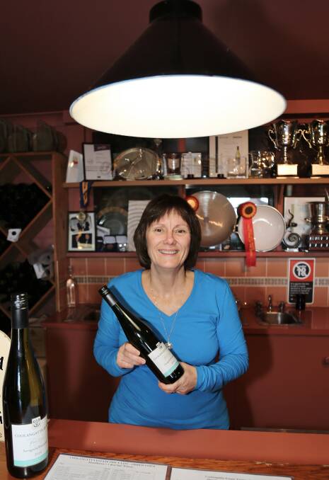 Eileen Bishop with a bottle of the new Coolangatta Estate Savagnin Frizzante, bringing a new style to the region. Picture: GREG ELLIS