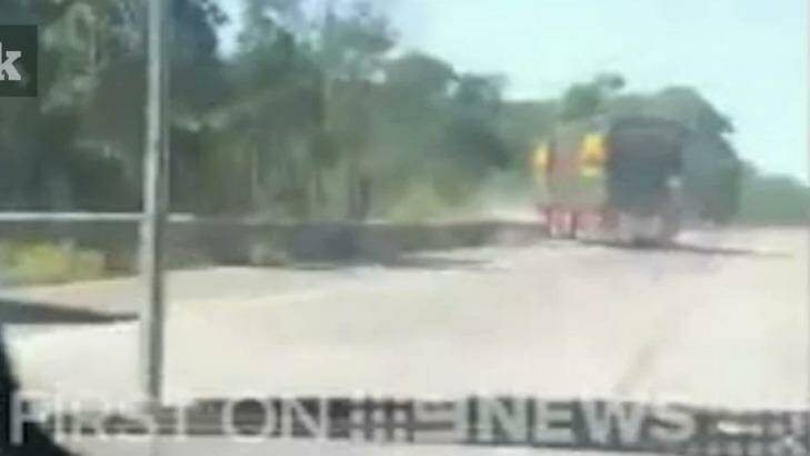 The woman filmed as the truck swerved over the road before crashing down the embankment.  Photo: Channel Nine