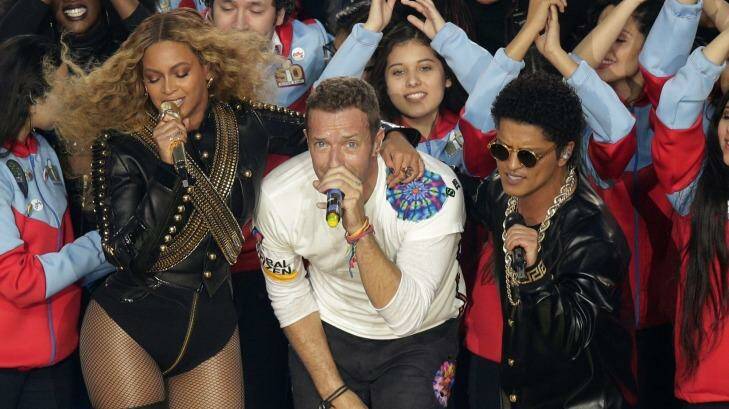 Beyonce, Coldplay singer Chris Martin, and Bruno Mars perform during halftime of the NFL Super Bowl 50 football game Sunday, Feb. 7, 2016, in Santa Clara, Calif. (AP Photo/Charlie Riedel) Photo: Charlie Riedel