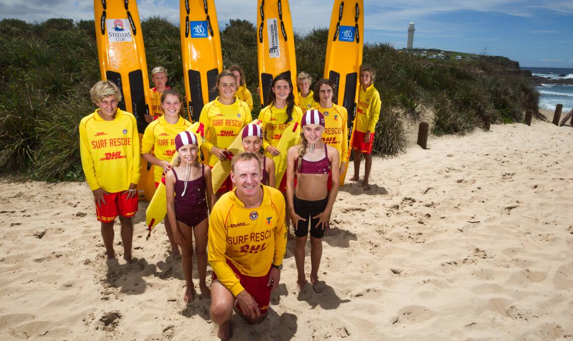 Wollongong City Surf Life Saving Club president Michael Jennett, front, with club members. Picture: CHRISTOPHER CHAN