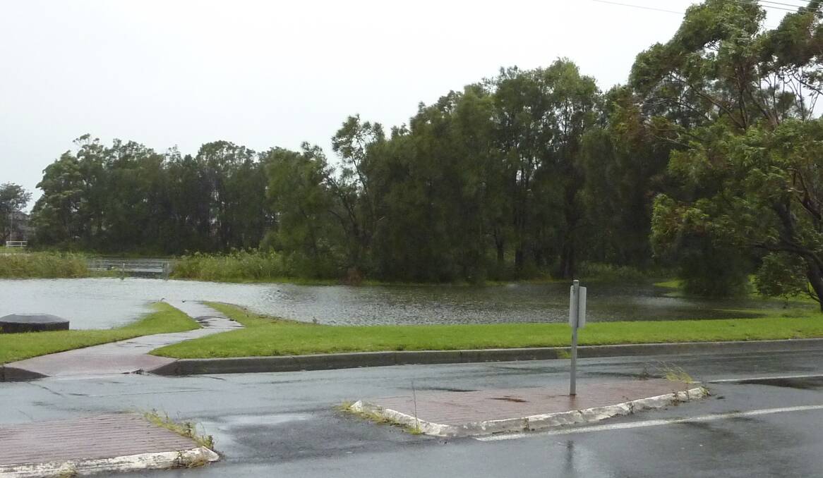 Under water: Near the proposed site for the new Warilla library at Keith Fletcher Park, which has been flooded after recent heavy rain. Picture: supplied.