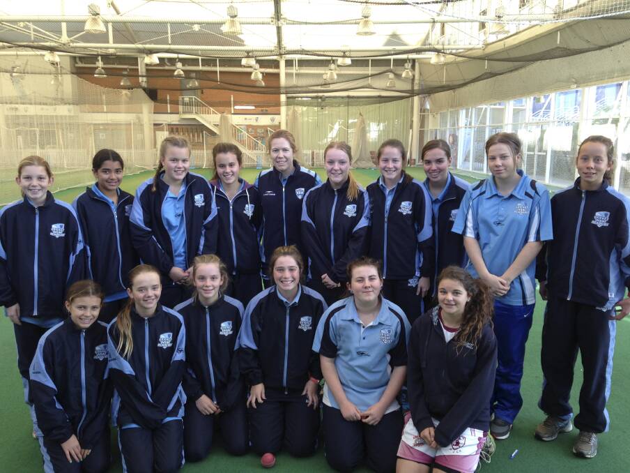 Role model: NSW captain Alex Blackwell, (back row, fifth from left) with the Cricket NSW Academy Illawarra-Southern girls' cricket squad at their training camp at the SCG.