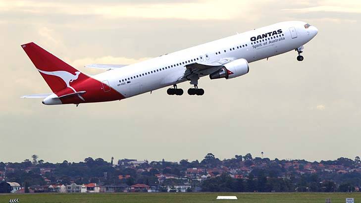 Qantas will boost the number of economy seats on board its Boeing 737s by reducing space for the toilets and galleys. Photo: Janie Barrett
