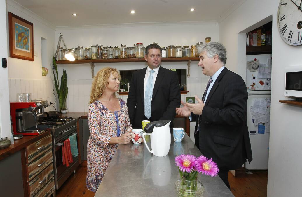 Becky Guggisberg talks to Kiama Labor candidate Glenn Kolomeitz and shadow minister for energy Adam Searle about electricity prices. Picture: ANDY ZAKELI