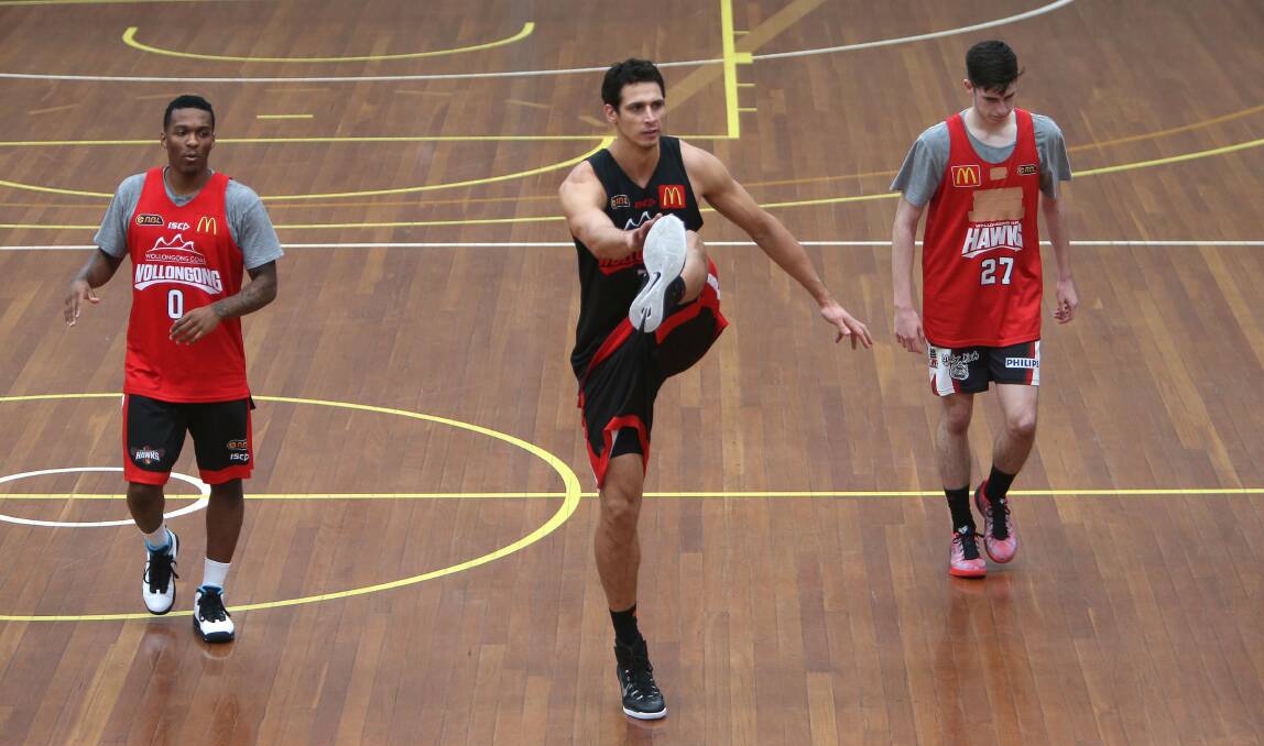 Wollongong Hawks captain Oscar Forman, centre, says the team is not working well together. Picture: KIRK GILMOUR