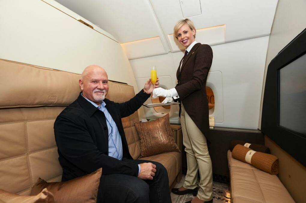 Etihad Airways A380 inaugural Residence passenger Gino Bertuccio with the on-board butler.