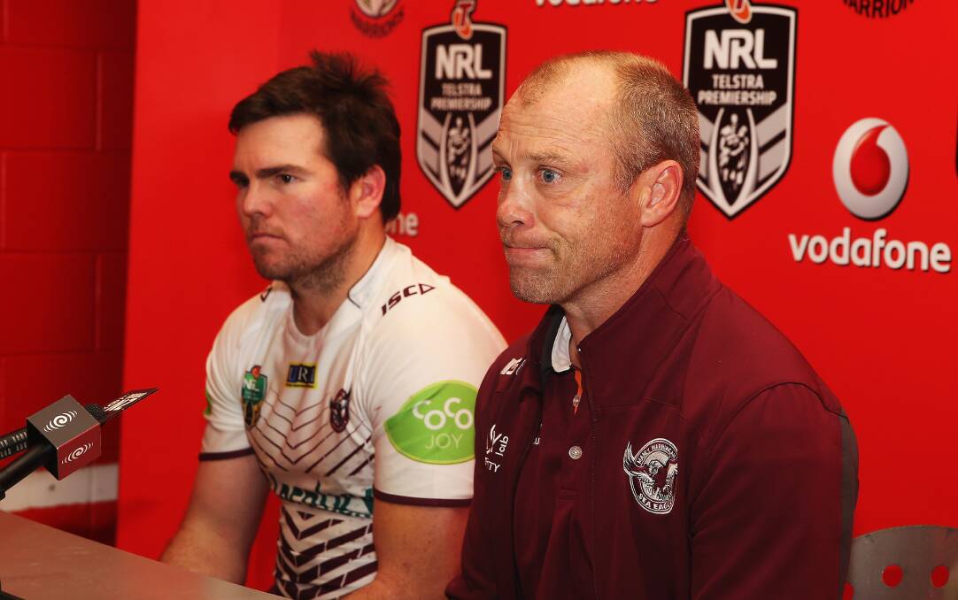Manly coach Geoff Toovey, right, seen here with captain James Lyon, on his way out. Picture: GETTY IMAGES