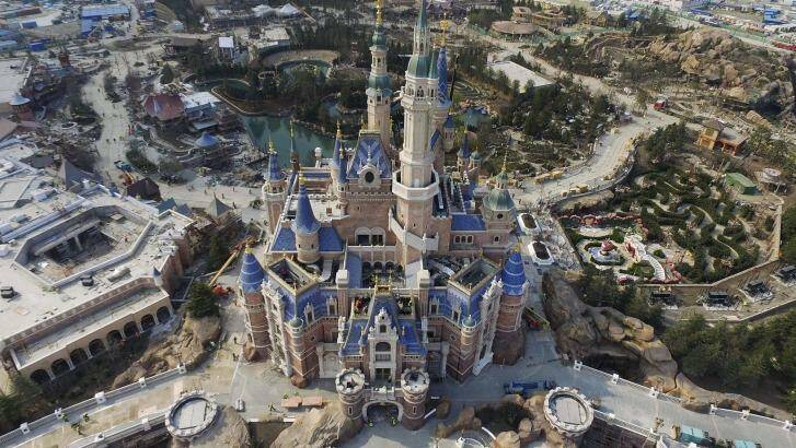 An aerial view of the Enchanted Storybook Castle under construction at the Shanghai Disney Resort in Shanghai. Staggs will miss the June opening of his biggest achievement.