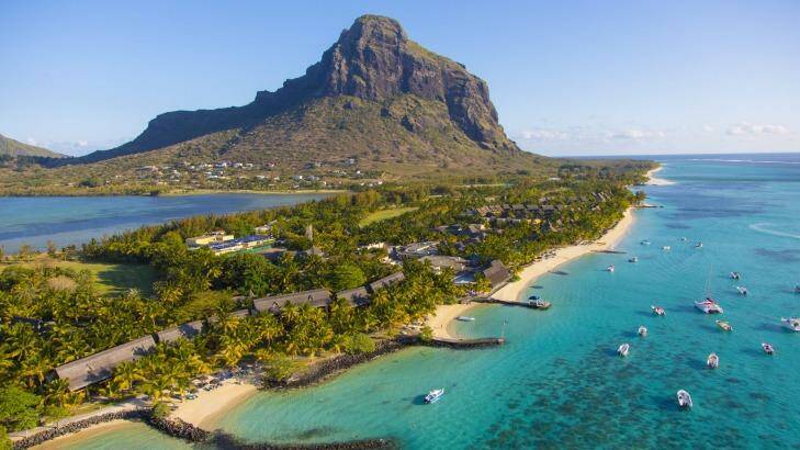 Le Morne Brabant and boats in turquoise sea, Mauritius.