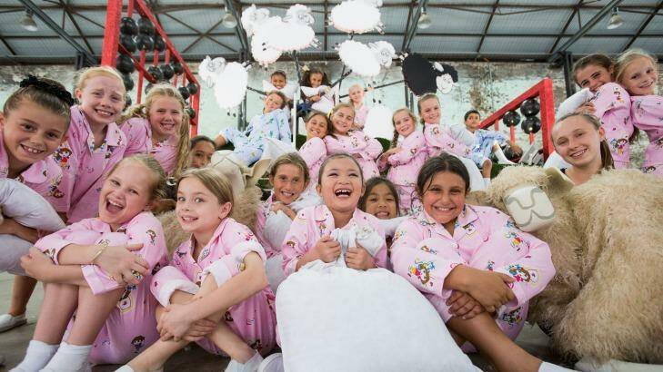 Strong start: Tourists have flooded into Sydney for Chinese New Year festivities, which will include a performance from these children in the Counting Sheep segment of the Twilight Parade. Photo: Cole Bennetts