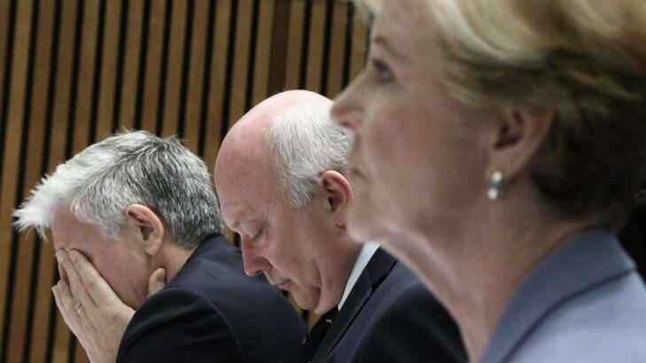 Department Secretary Chris Moraitis, Attorney-General George Brandis, Human Rights Commission President Professor Gillian Triggs, during a Senate hearing at Parliament House in Canberra on Tuesday,  February 24.  Photo: Alex Ellinghausen