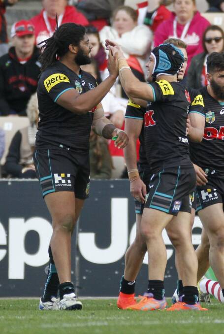 Men in black: Jamal Idris and Jamie Soward celebrate another try at WIN Stadium on Sunday. Picture: ANDY ZAKELI