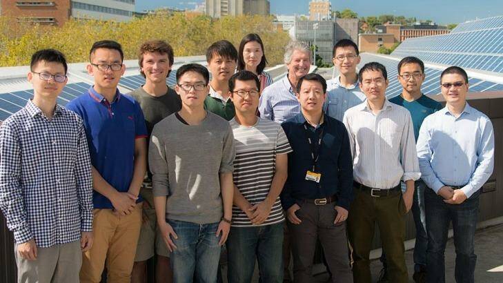 Solar whizzes: Dr Hao (at rear) with Dr Martin Green and solar cell researchers at UNSW. Photo: Supplied
