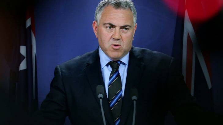 ''Still more work to be done": Treasurer Joe Hockey at a press briefing in Sydney on Sunday. Photo: Kate Geraghty