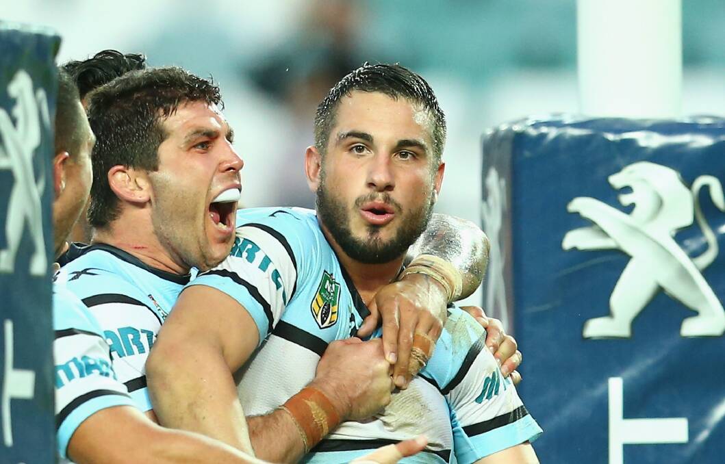 Sharks Michael Ennis and Jack Bird celebrate Bird's try against the Roosters in round five. Bird comes home to face the Dragons on Sunday. Picture: GETTY IMAGES