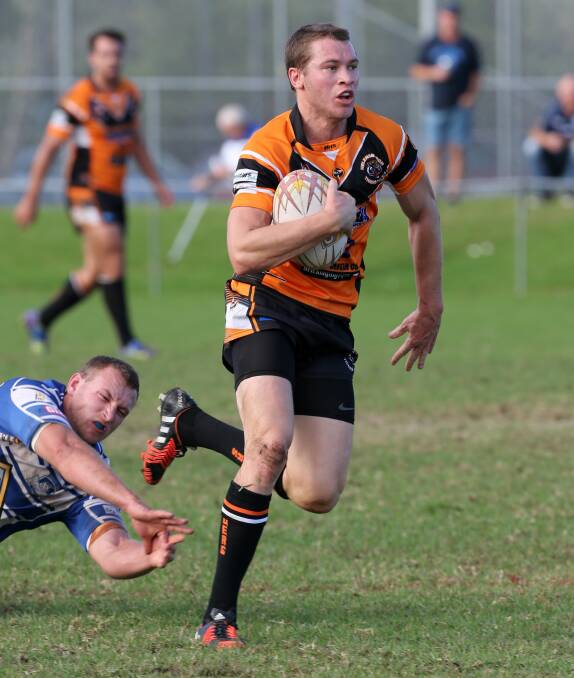 Tigers' Eamon Hillen breaks through the Thirroul defence. He earned high praise from coach Ryan Powell for being in the right place at the right time. Picture: ROBERT PEET