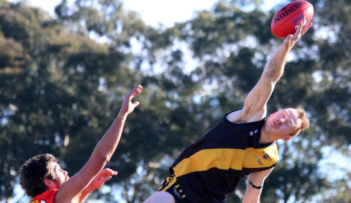 Bomaderry's Brent Herdman makes a mark during the match at Artie Smith Oval. Picture: COURTNEY WARD
