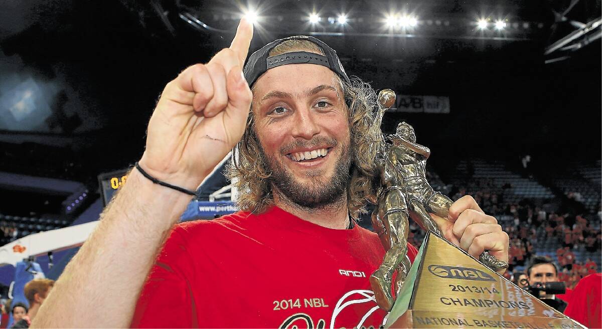 PERTH, AUSTRALIA - APRIL 13: Jesse Wagstaff of the Wildcats celebrates after winning game three and the NBL Grand Final series between the Perth Wildcats and the Adelaide 36ers at Perth Arena on April 13, 2014 in Perth, Australia.  (Photo by Paul Kane/Getty Images)