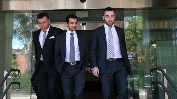Dr Shammi Kabir (middle) leaves Glebe Coroner's Court, accompanied by barrister Robert Sutherland SC and solicitor Nick Hanna. Photo: Louise Kennerley