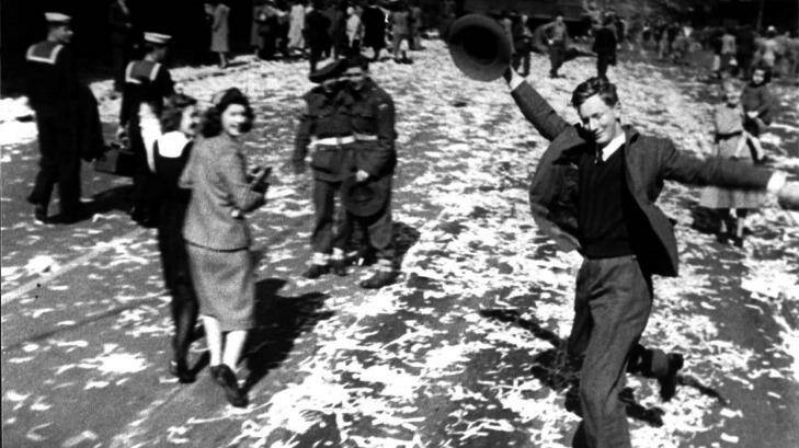 Frank McAlary, dubbed The Dancing Man, twirls through the Sydney streets on Victory in the Pacific day, 15 August 1945.