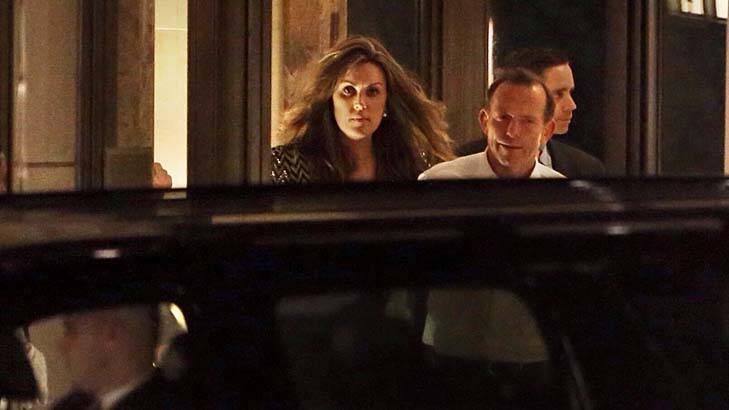 Dinner guests: Tony Abbott and his chief-of-staff, Peta Credlin, leave Rupert Murdoch's apartment building. Photo: Andrew Meares