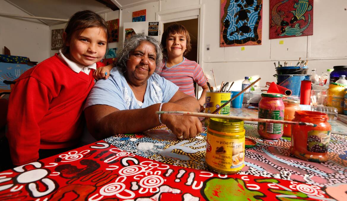 Capturing culture: Laylah Moylan, Aunty Lorraine Brown and Tristan Archibald share cultural stories. Picture: DAVID TEASE