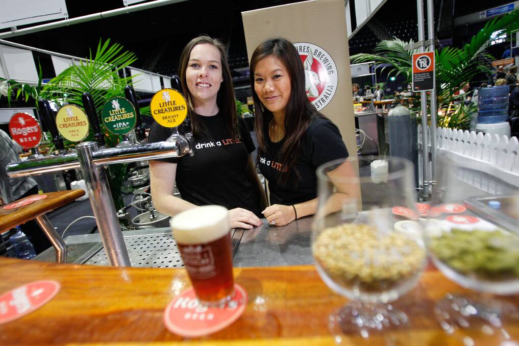 From left, Sarah Coghlan and Amy Wong at the Froth and Bubbles Beer festival at the WIN Entertainment Centre. Picture: CHRISTOPHER CHAN