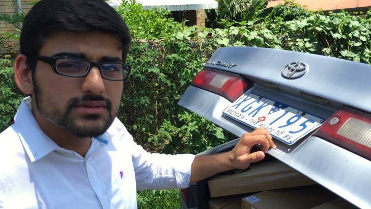 Vocational education salesman "Hamza" at a housing commission street in Queensland in late 2015. He came with a car full of laptops.  Photo: Michael Bachelard