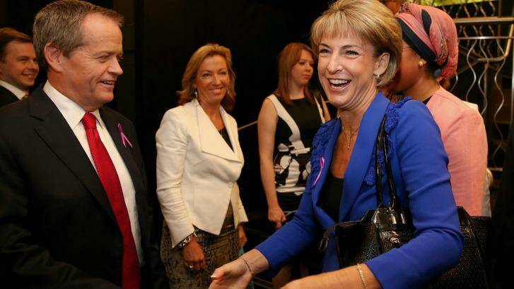 Opposition Leader Bill Shorten greets senator Michaela Cash, at the International Women's Day UN Women Australia Forum at the National Press Club. Photo: Alex Ellinghausen