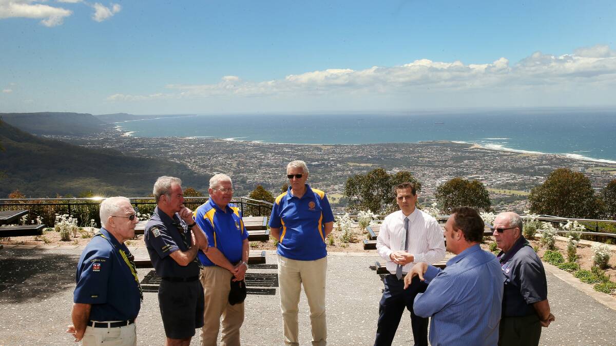 Scouts George Kolsky and Ron Critcher with Rotarians Ian McKensey and Rod Oxley, and MP Ryan Park, Scout Michael Barnes, and Leigh Stewart at Mt Keira Summit Park. Picture: KIRK GILMOUR