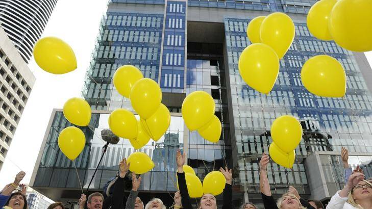 Family and supporters of Allison Baden-Clay release balloons outside court. Photo: Claudia Baxter