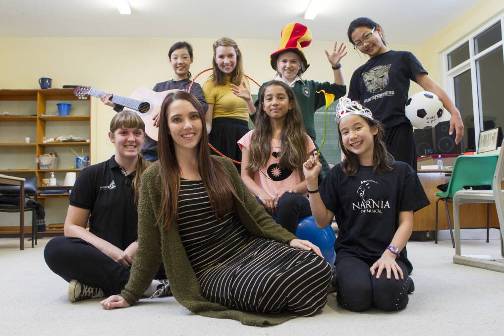 Drama teacher and Illawarra Young Business Woman of the Year Erin Bubb with members of her drama studio, Sue Kim, Anastasia Bubb, Emily Peters, Alicia Widjaja, Cassandra Kerr, Rachel Weeks and Emily Read. Picture: CHRISTOPHER CHAN
