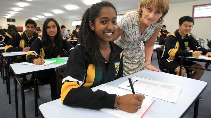 Baulkham Hills High students practise their handwriting ahead of the HSC. Photo: Gene Ramirez