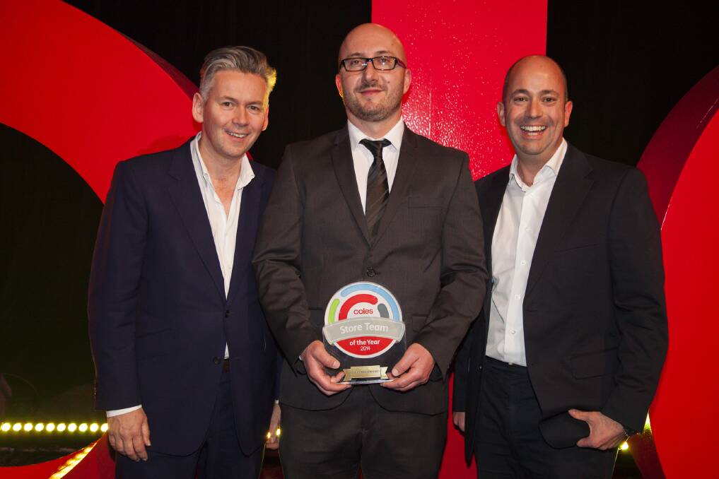 Top team: Jim Pazarkoski accepts the award with Coles managing director John Durkan and supply chain director Andy Coleman.