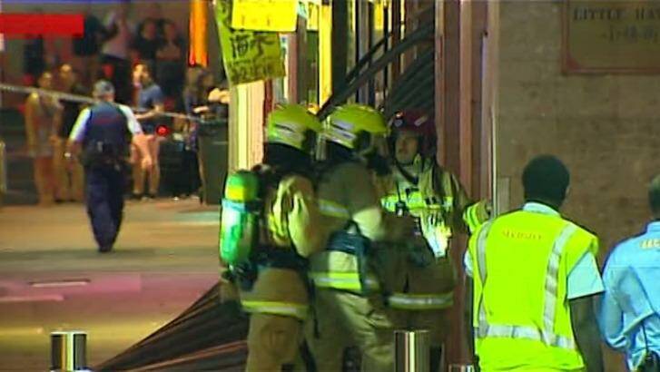 Firefighters walk into the building where a gas explosion struck on Tuesday night. Photo: Seven News