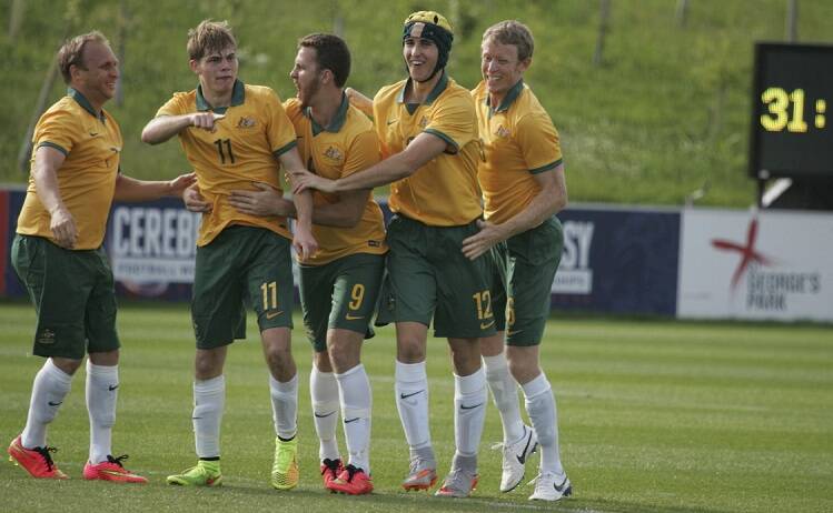 Zac Jones (fourth from left) celebrates with his Pararoos teammates.