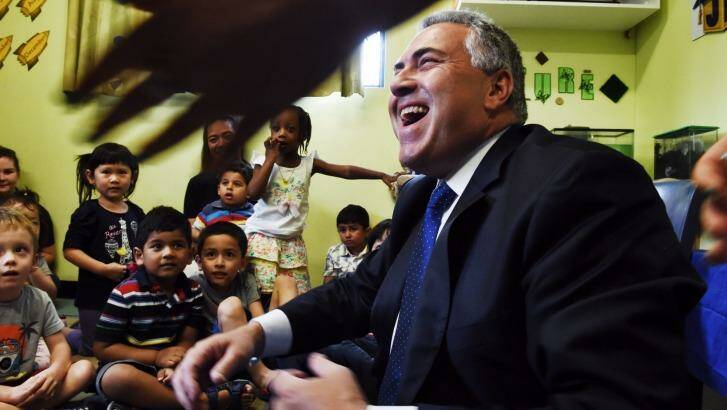 Treasurer Joe Hockey, who visited a childcare centre in Padstow, says Tony Abbott will "absolutely" remain Prime Minister next week. Photo: Nick Moir