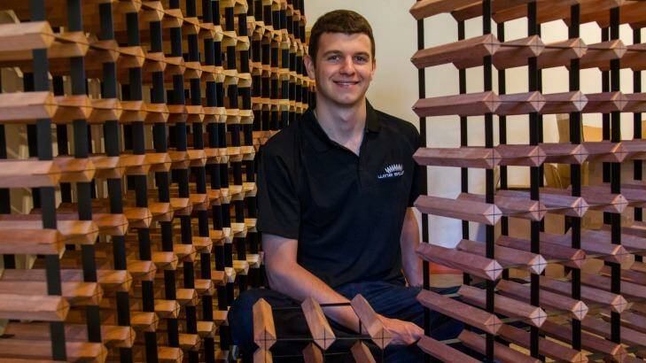 Mathew Childs with his wine storage products. Photo: Thomas Tapia