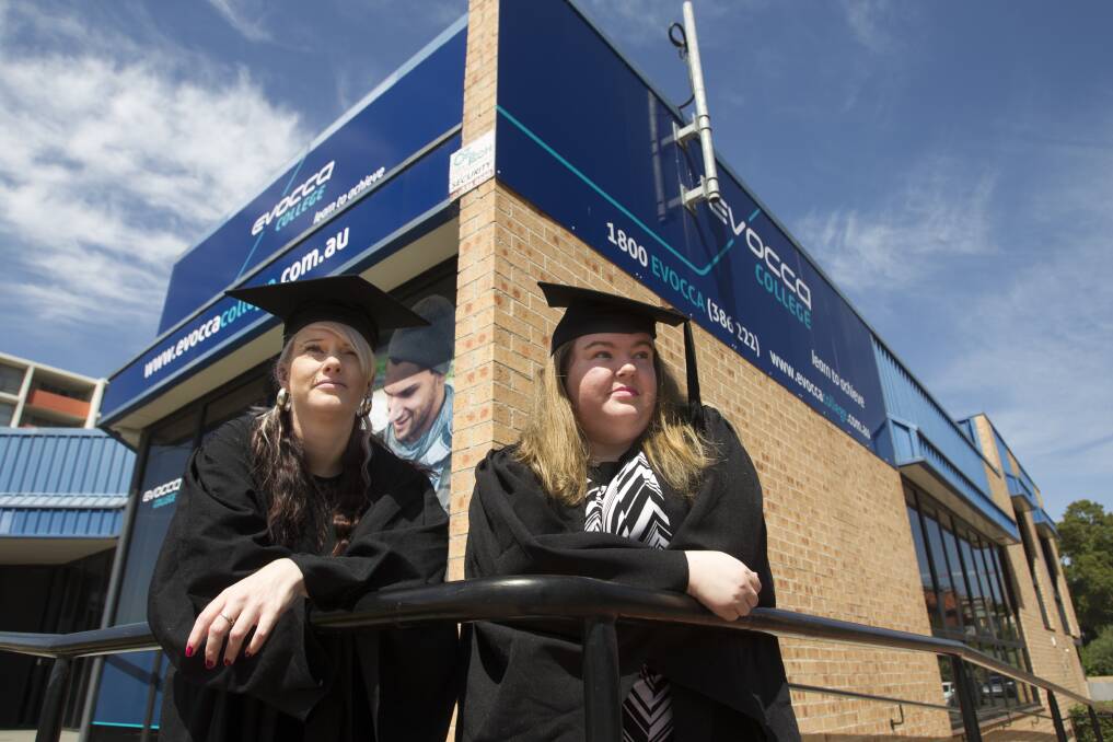 Jaime Hammond and Natalie Smith are two of the students graduating with a business-related diploma from Evocca College in Wollongong on Monday. Picture: CHRISTOPHER CHAN