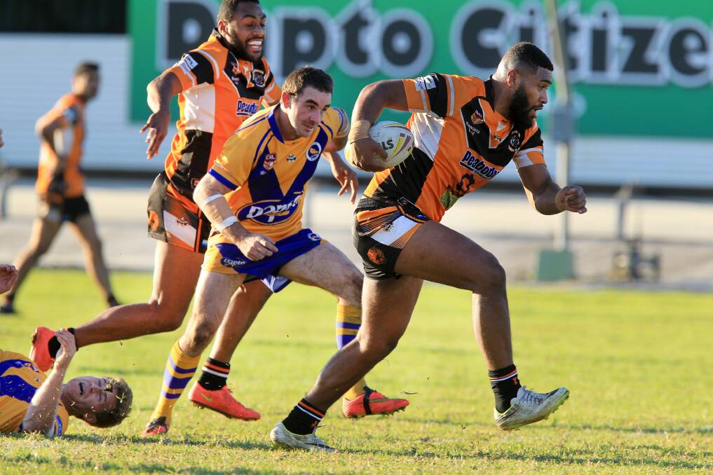 Helensburgh Tigers scored six first-half tries in their 40-18 thumping of Dapto Canaries. Picture: SYLVIA LIBER