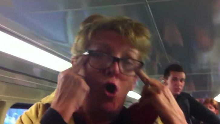 Remorseful: Footage posted on Youtube shows Karen Bailey during her racist rant on a train.